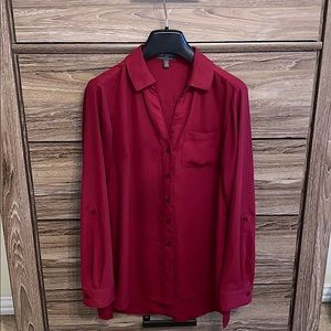 The limited dressy, button up blouse